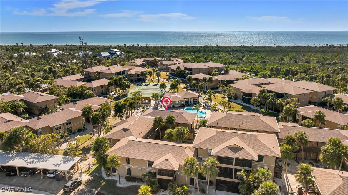 5117 Sea Bell Road, Unit C207 Sanibel, FL 33957 - Photo 26 of 43 an aerial view of residential houses with outdoor space