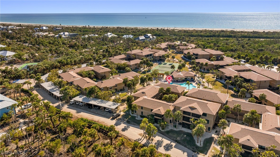 5117 Sea Bell Road, Unit C207 Sanibel, FL 33957 - Photo 3 of 43 an aerial view of residential houses with outdoor space
