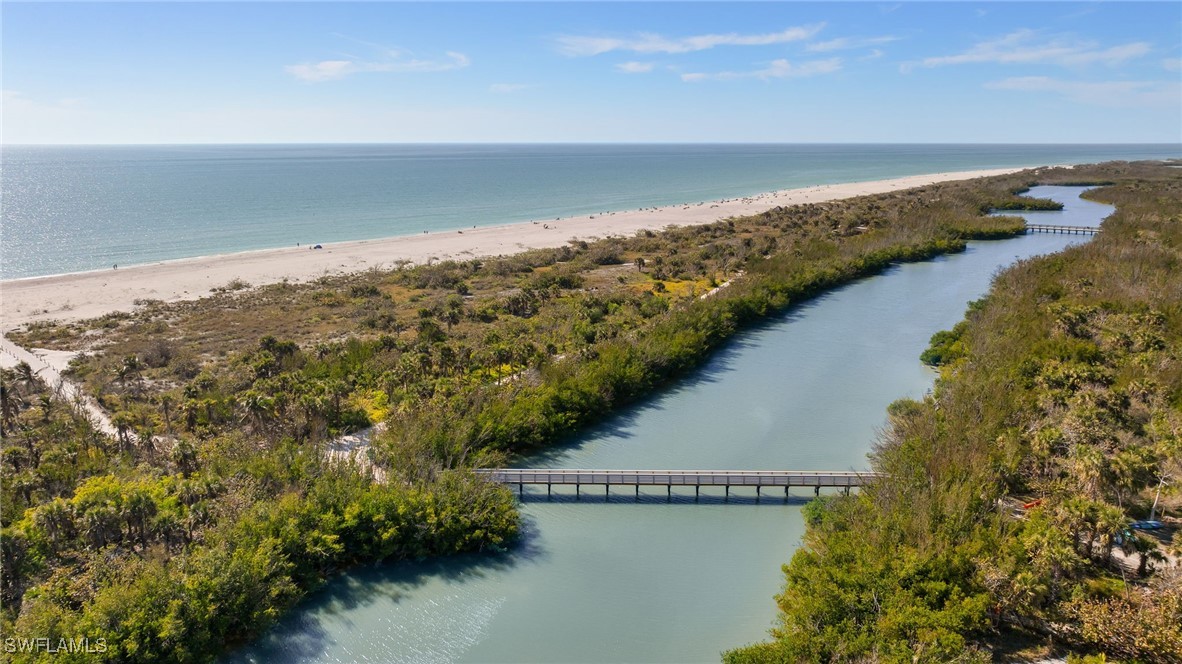 5117 Sea Bell Road, Unit C207 Sanibel, FL 33957 - Photo 32 of 43 a view of an ocean and beach