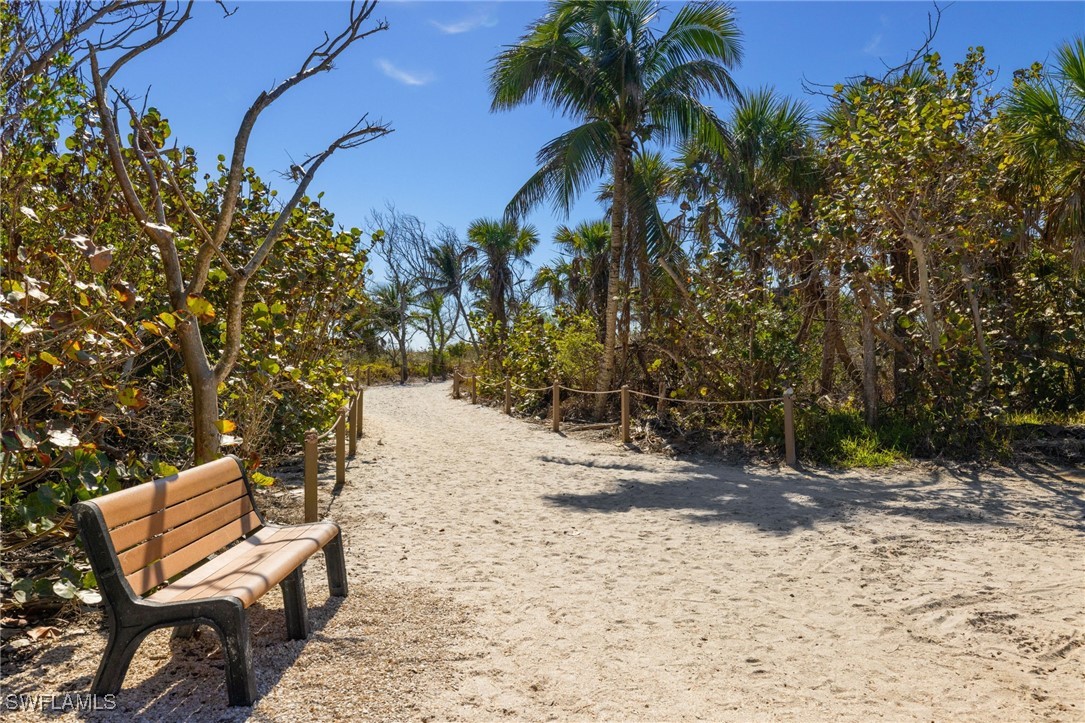 5117 Sea Bell Road, Unit C207 Sanibel, FL 33957 - Photo 38 of 43 a view of a backyard of the house