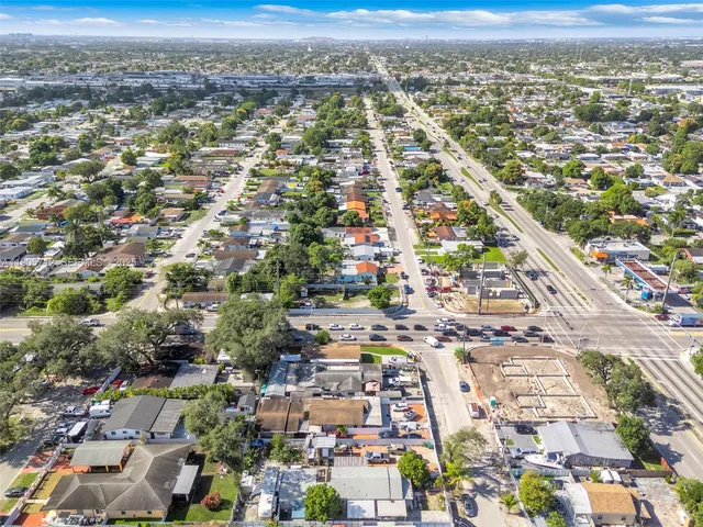 an aerial view of residential building with parking space