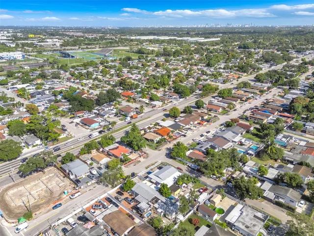 an aerial view of residential building and street