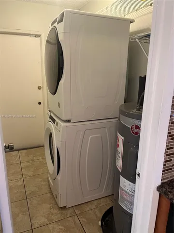 a bathroom with a toilet a sink and shower