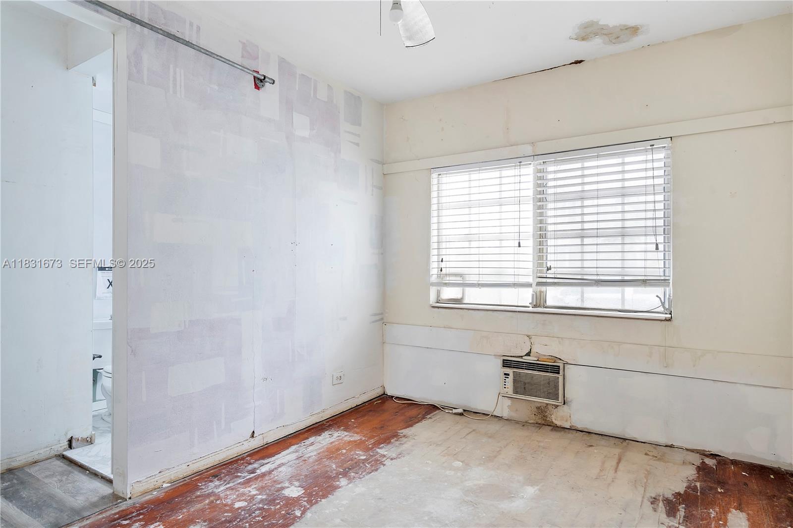 836 10th Street, Unit 6 Miami Beach, FL 33139 - Photo 12 of 12 a view of a room with a window