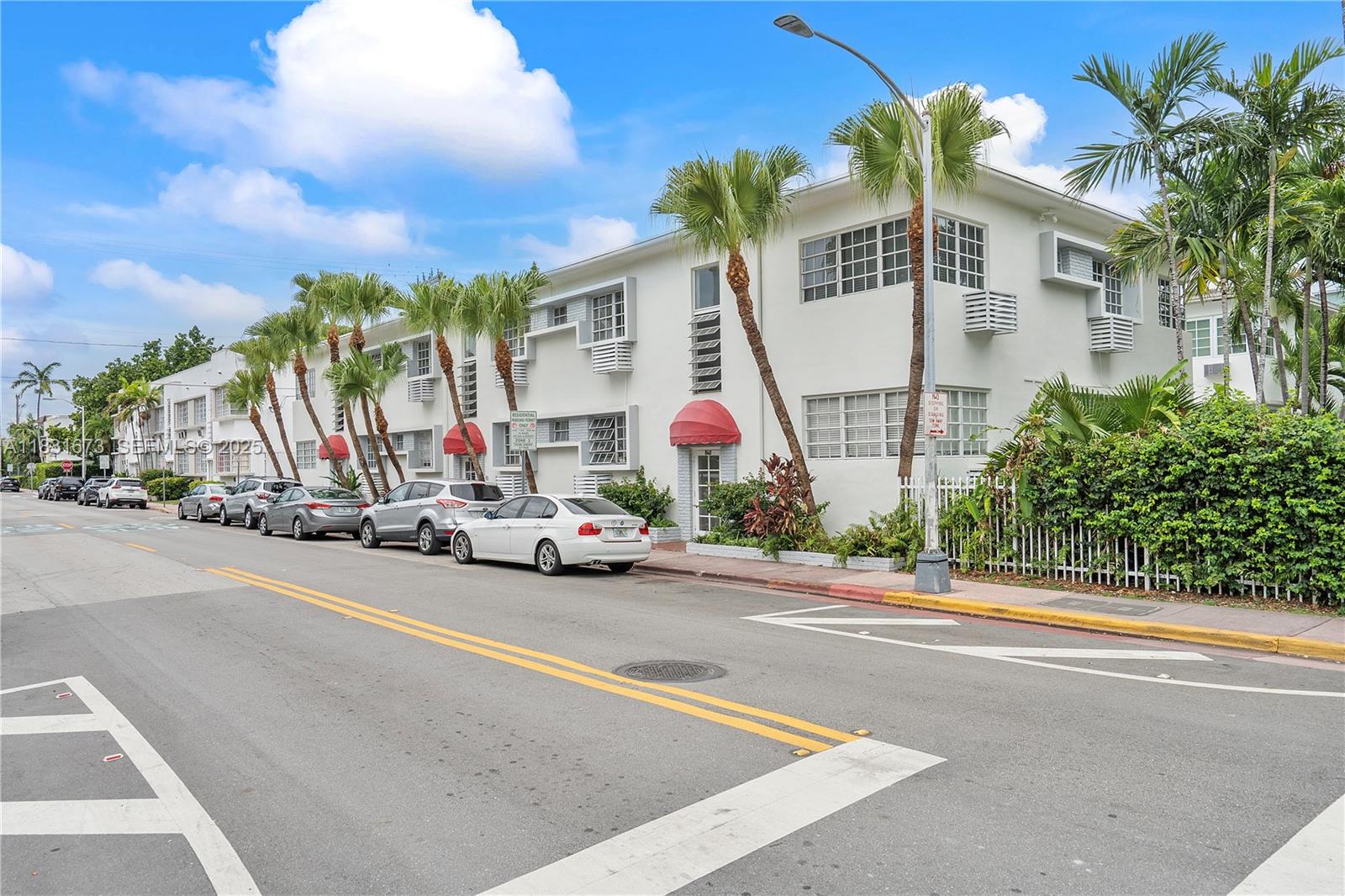 836 10th Street, Unit 6 Miami Beach, FL 33139 - Photo 2 of 12 a view of a street with a cars parked in front of it