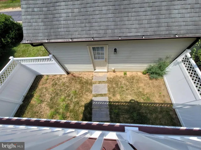 a view of a back yard of the house