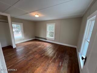 327 Mantoloking Road Brick, NJ 08723 - Photo 2 of 12 an empty room with wooden floor and windows
