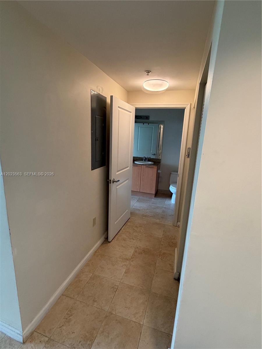 2021 Southwest 3rd Avenue, Unit 902 Miami, FL 33129 - Photo 7 of 14 a view of a hallway with some storage