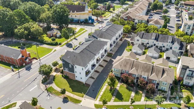 an aerial view of a house with a swimming pool