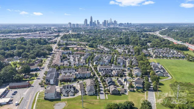 a view of a city with tall buildings
