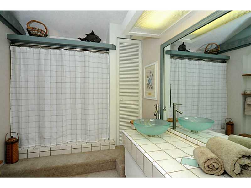 5510 Glass Road Pittsburgh, PA 15205 - Photo 12 of 25 Full Bath. The full bath on the main level offers tile floors, a tile vanity with vessel sink with waterfall faucets and a skylight.