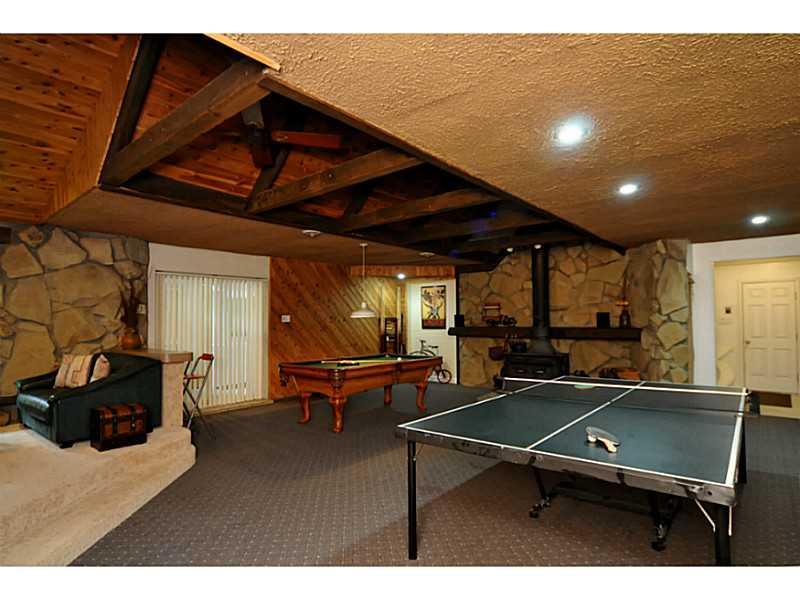 5510 Glass Road Pittsburgh, PA 15205 - Photo 17 of 25 Basement/Game Room. The game room also includes a wood burning fireplace with hearth, a vaulted ceiling with cedar paneling and exposed beam accents.