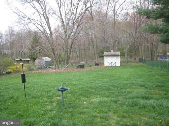 15416 Wembrough Street Silver Spring, MD 20905 - Photo 7 of 13 View to end of lot in backyard.