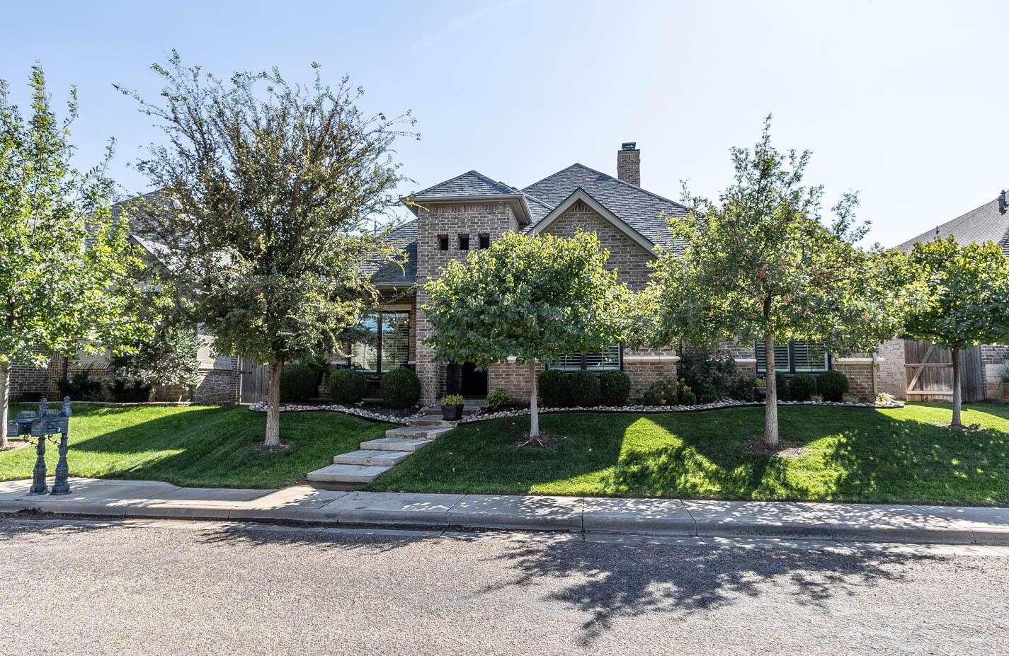 6809 Baccus Amarillo, TX 79124 - Photo 20 of 20 a house with green field in front of it