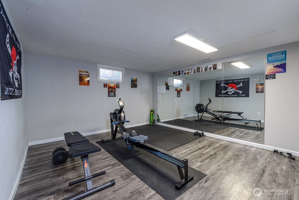 814 117th Street South Tacoma, WA 98444 - Photo 17 of 22 a room with furniture and wooden floor