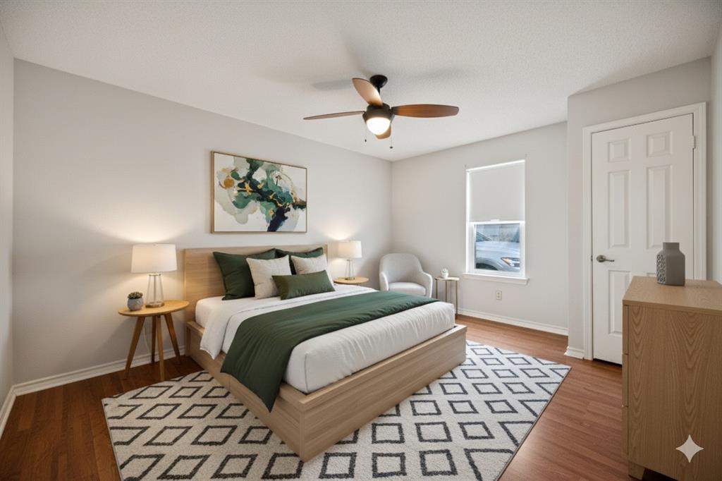 18111 Whispering Gables Lane Dallas, TX 75287 - Photo 12 of 15 a bedroom with double bed and a window