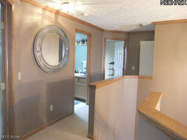 3795 Stonebridge Boulevard Akron, OH 44321 - Photo 13 of 24 At the top, an open hall leads to 4 spacious bedrooms.