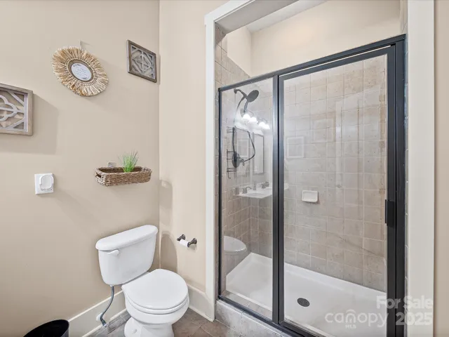 a bed room with a bed and window