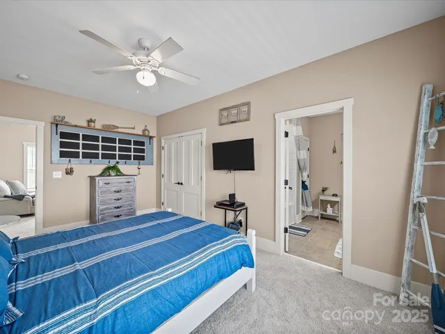 an aerial view of a house with a lake view