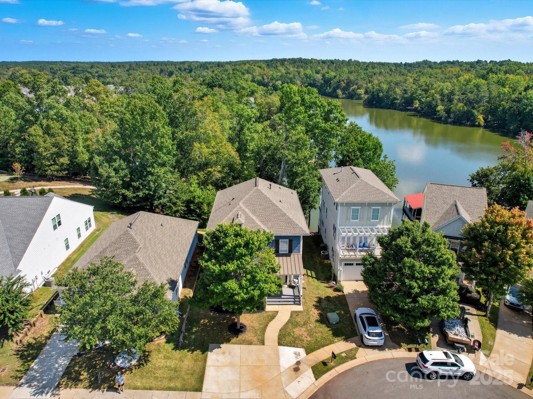 28117 Egrets Court Lancaster, SC 29720 - Photo 38 of 46 an aerial view of a house with a garden and lake view