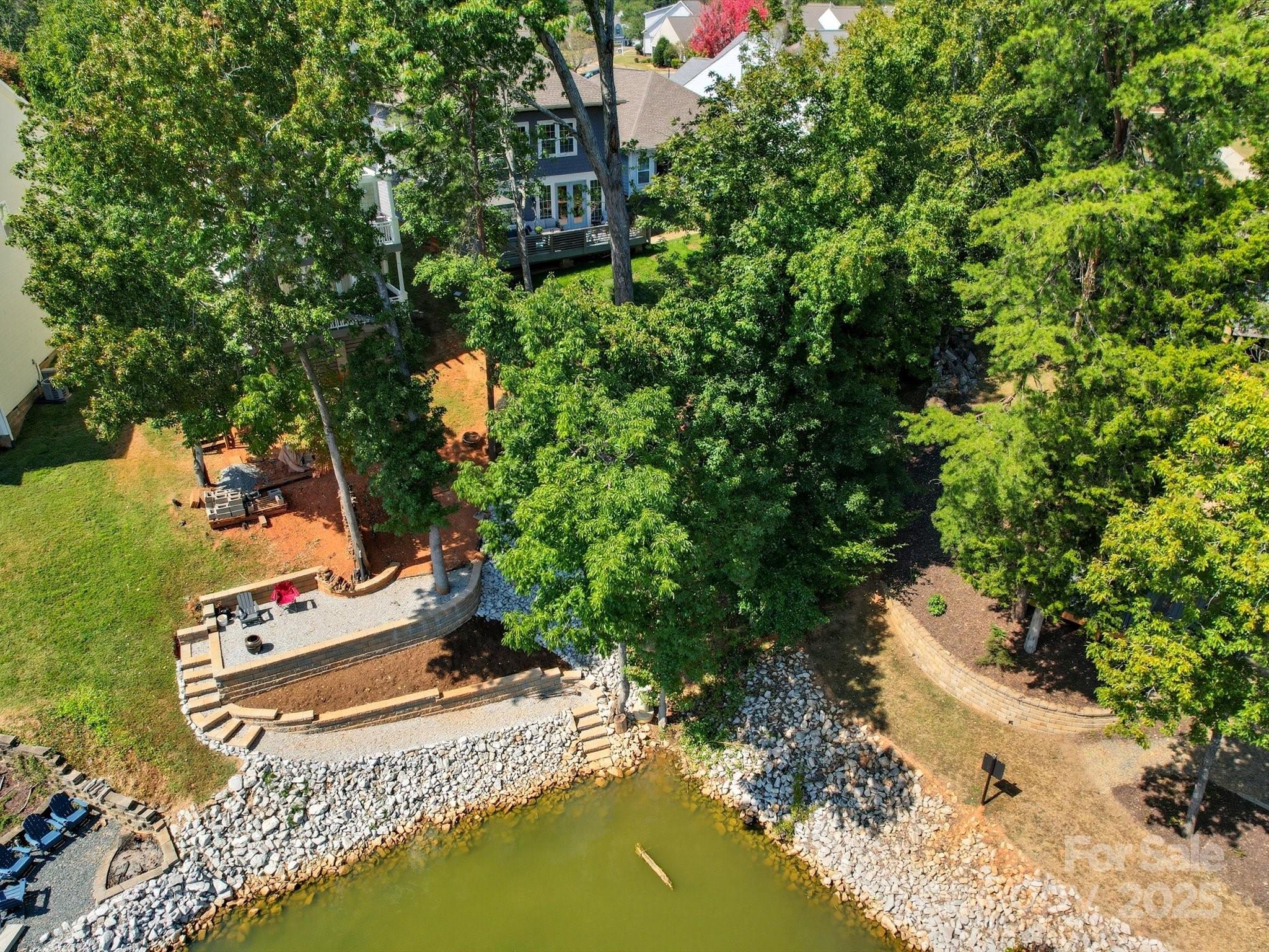 28117 Egrets Court Lancaster, SC 29720 - Photo 40 of 46 a sign board with a lake view