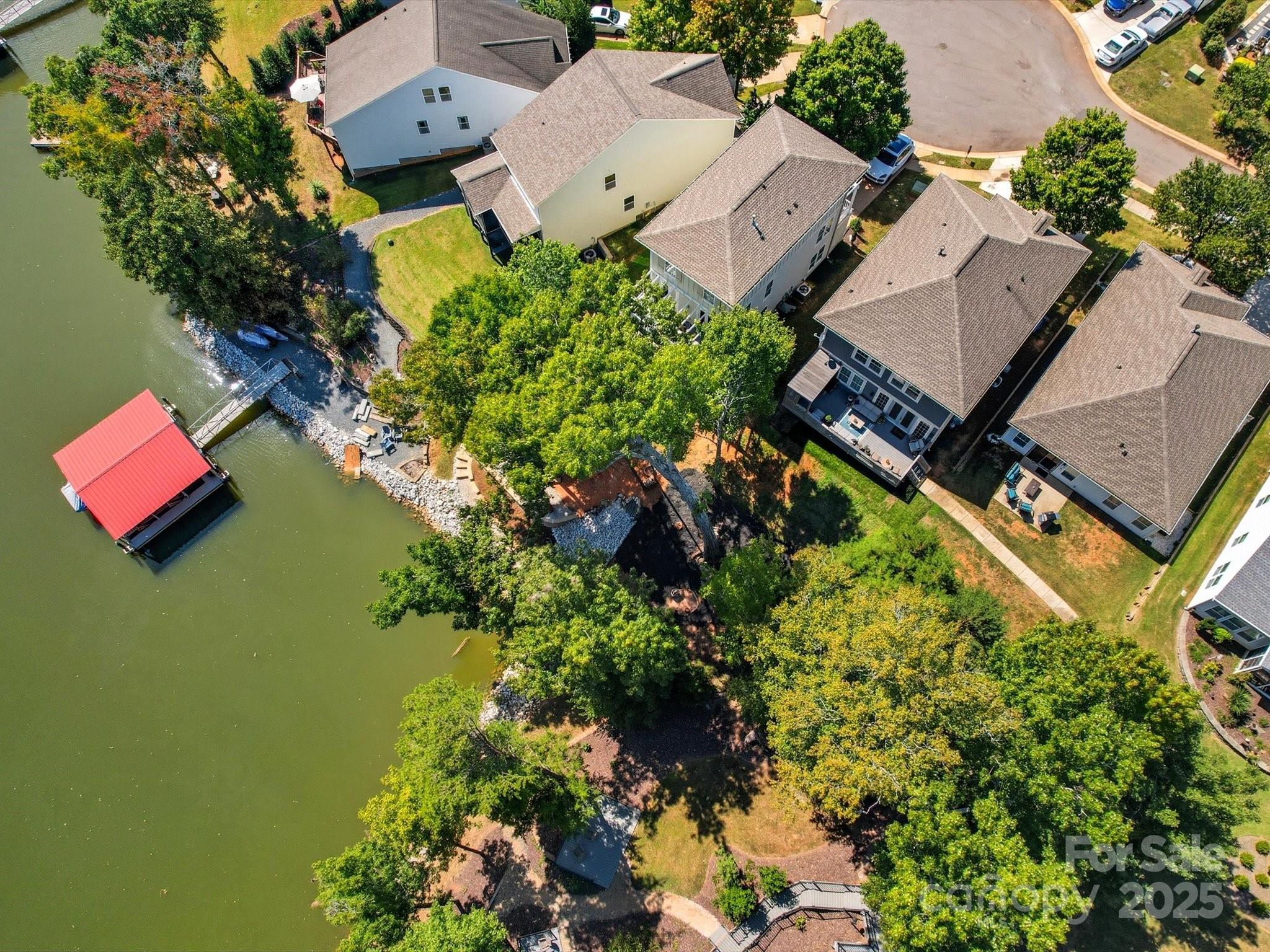 28117 Egrets Court Lancaster, SC 29720 - Photo 43 of 46 an aerial view of residential house with swimming pool and lawn chairs