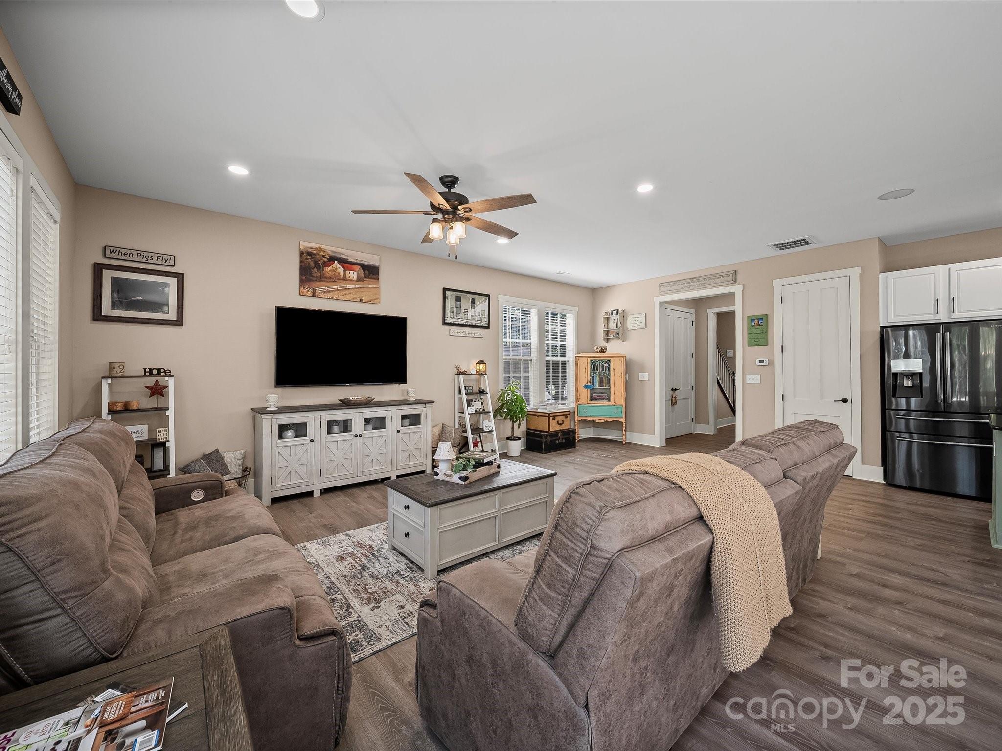 28117 Egrets Court Lancaster, SC 29720 - Photo 5 of 46 a living room with furniture and a flat screen tv