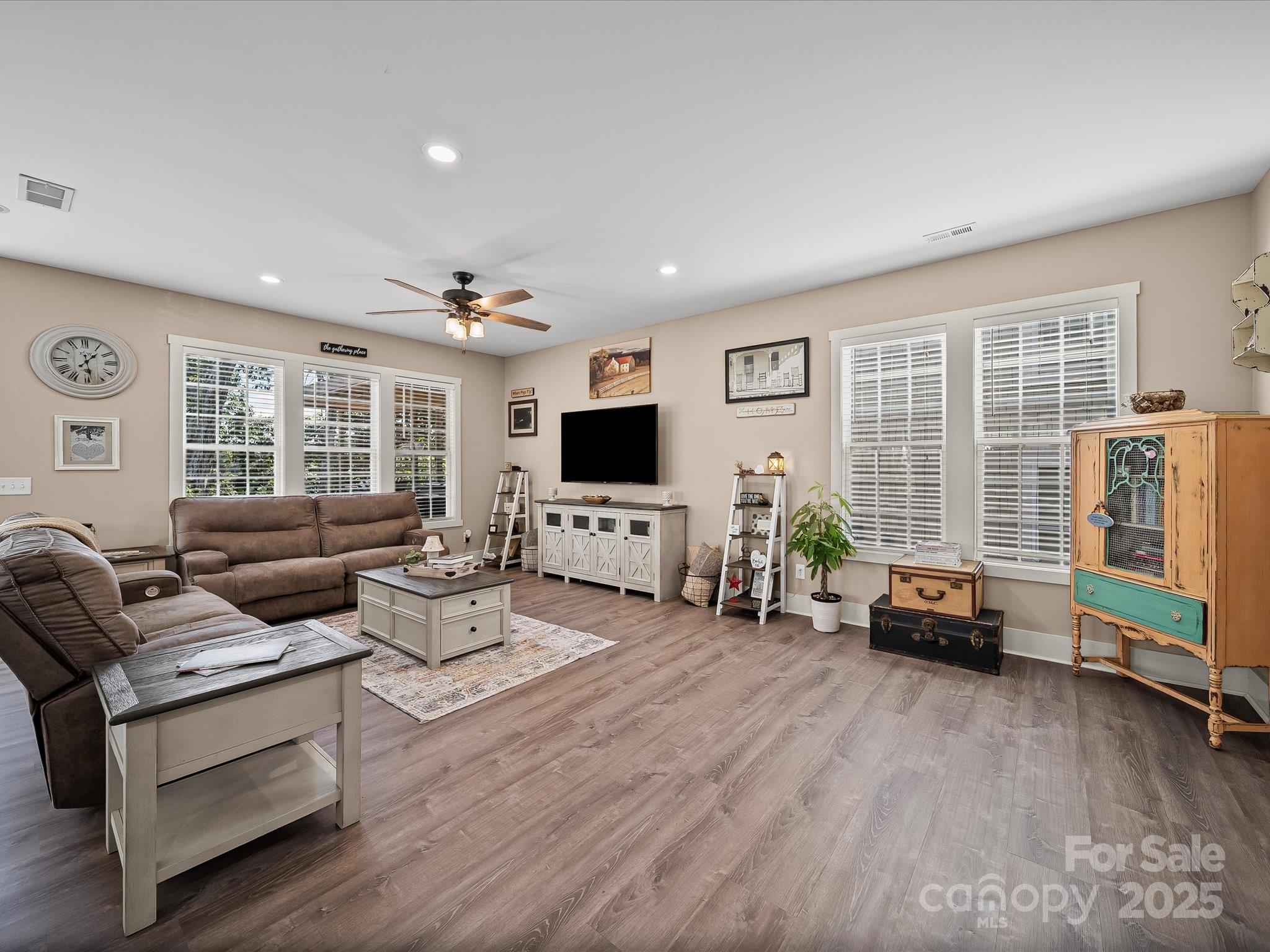 28117 Egrets Court Lancaster, SC 29720 - Photo 6 of 46 a living room with furniture and a flat screen tv
