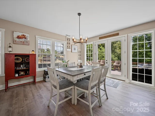 a view of a dining room kitchen and a window