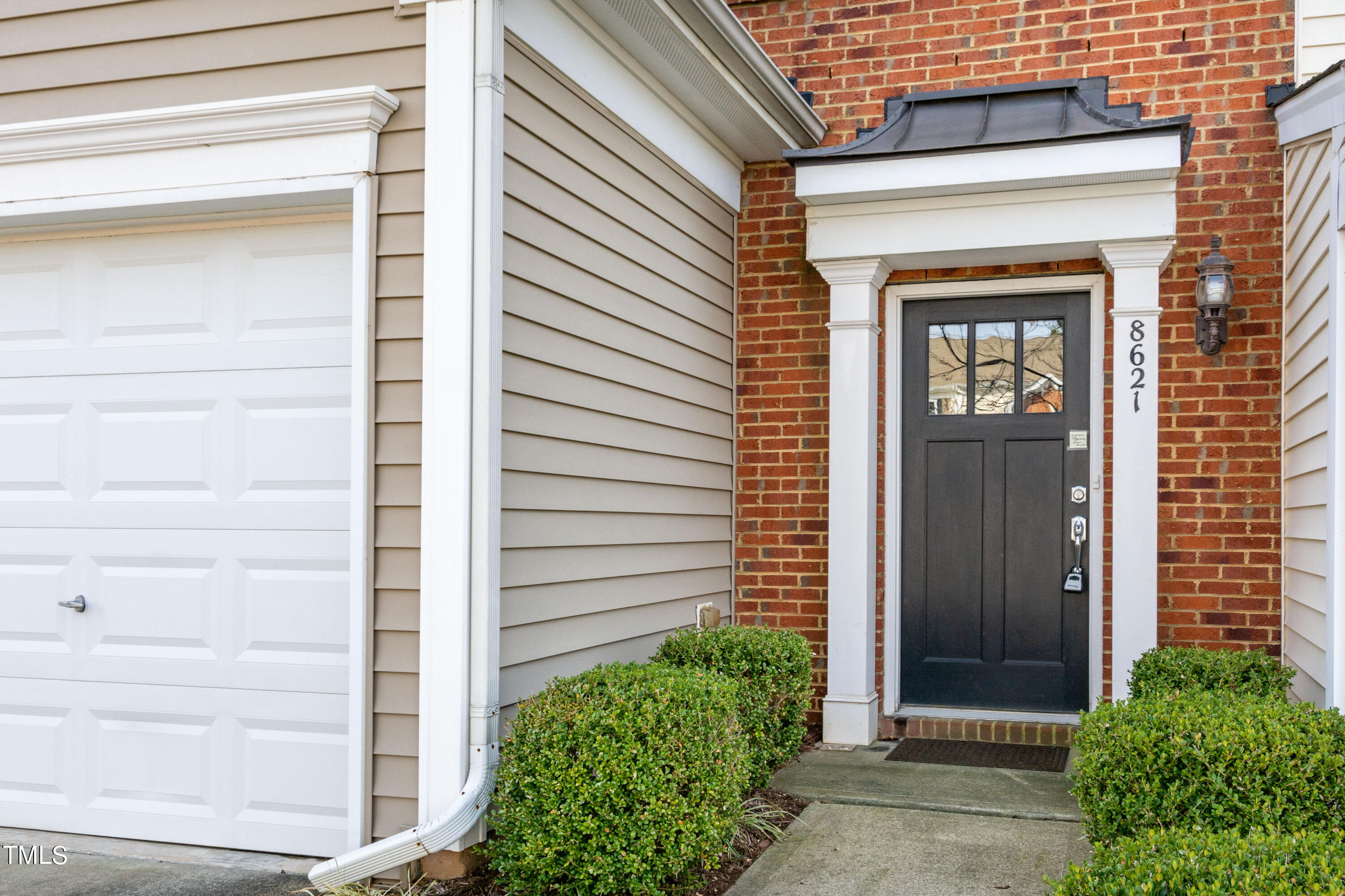 8621 Thunderwood Drive Raleigh, NC 27617 - Photo 2 of 35 a view of front door of house