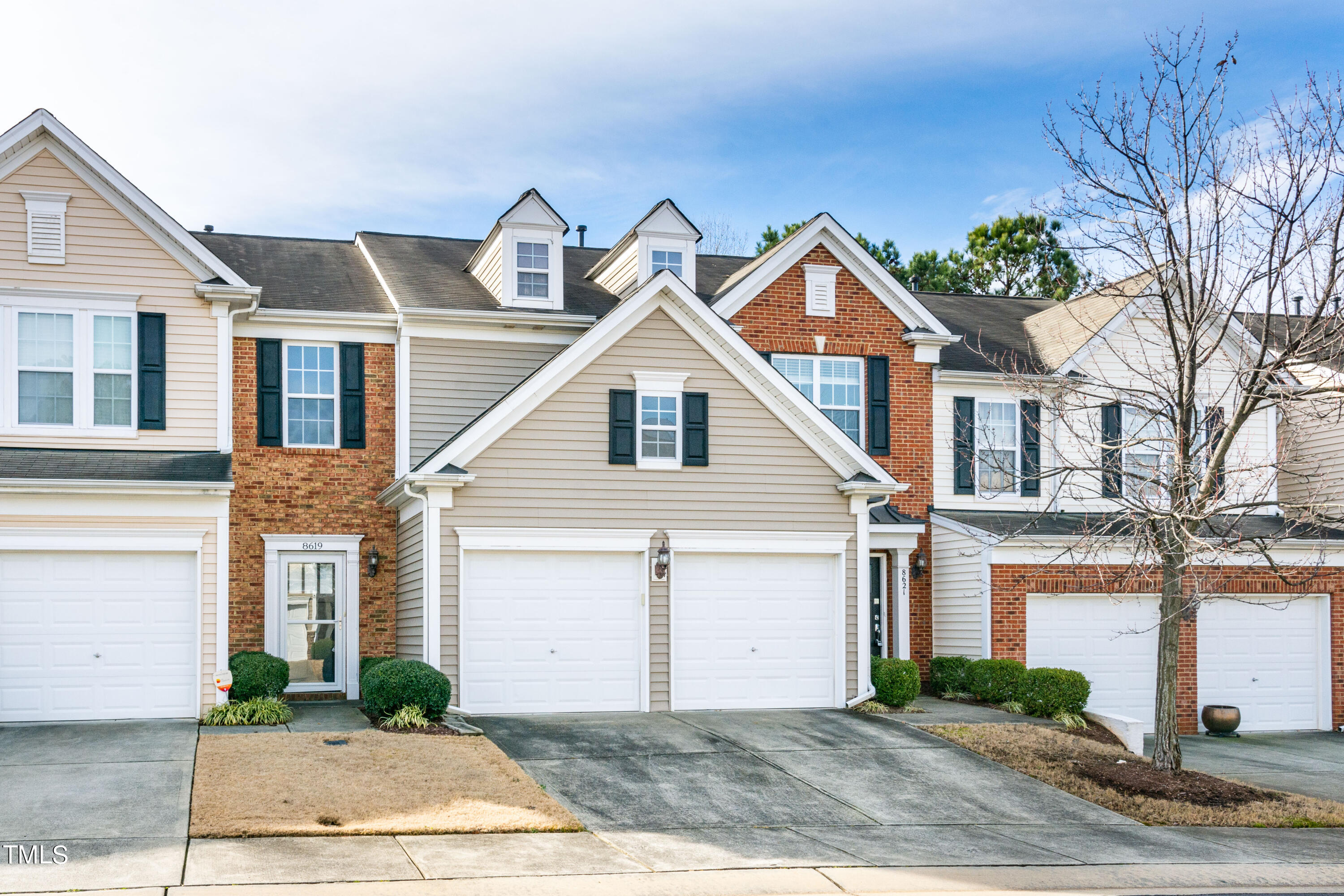 8621 Thunderwood Drive Raleigh, NC 27617 - Photo 33 of 35 a front view of a house with garden