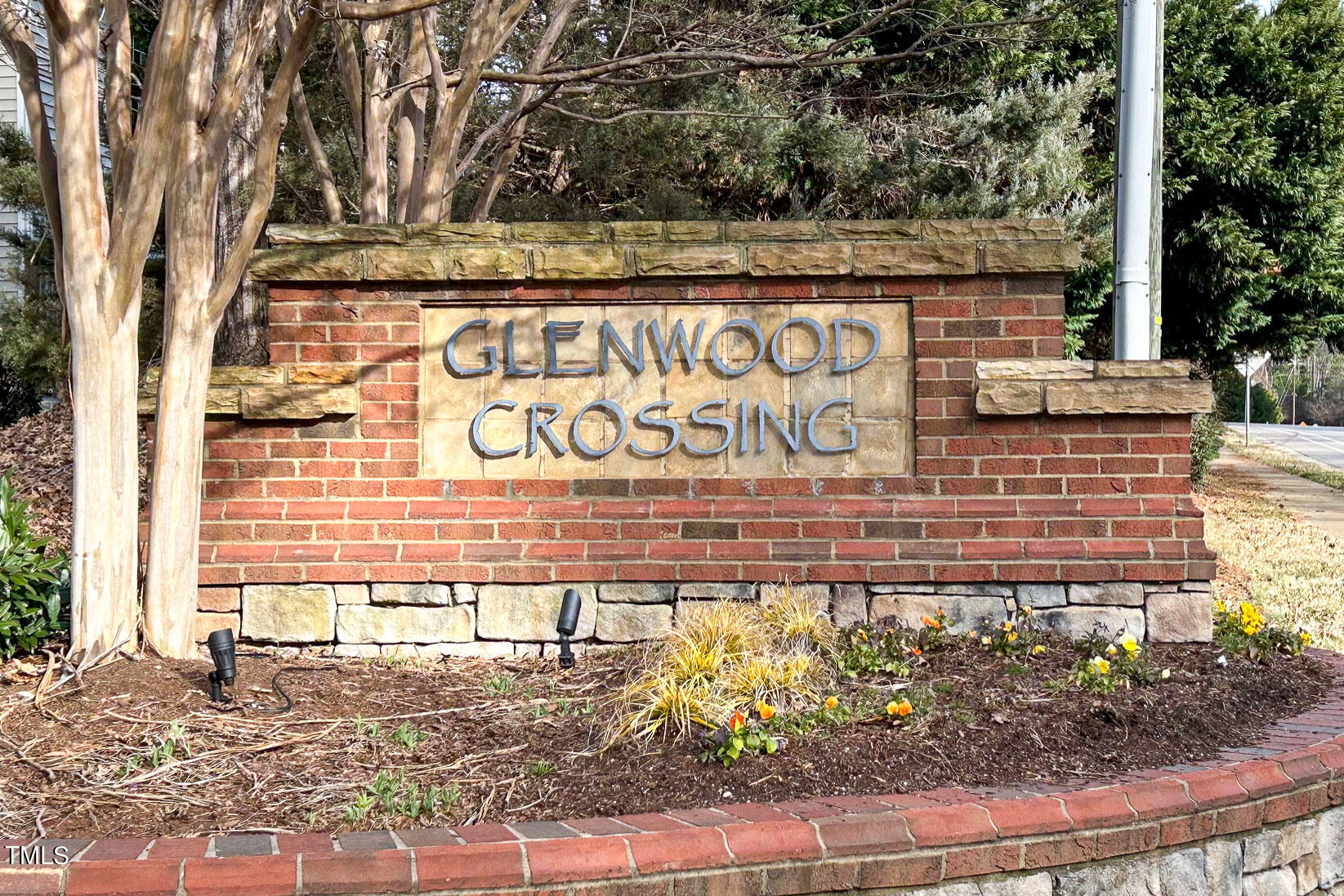 8621 Thunderwood Drive Raleigh, NC 27617 - Photo 35 of 35 a sign on the side of a building