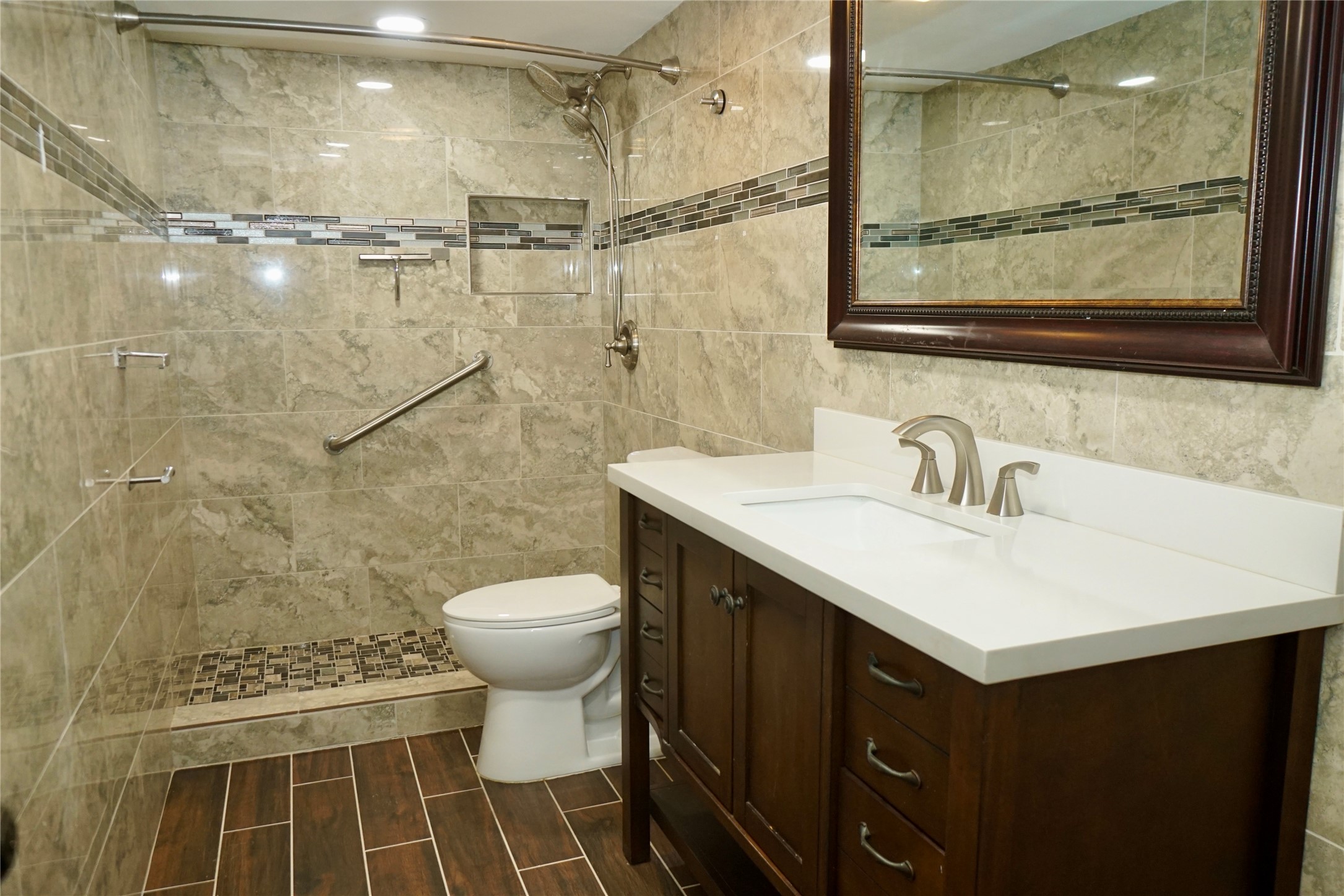 8275 Sands Point Drive, Unit 176 Houston, TX 77036 - Photo 12 of 31 a bathroom with a sink toilet and shower