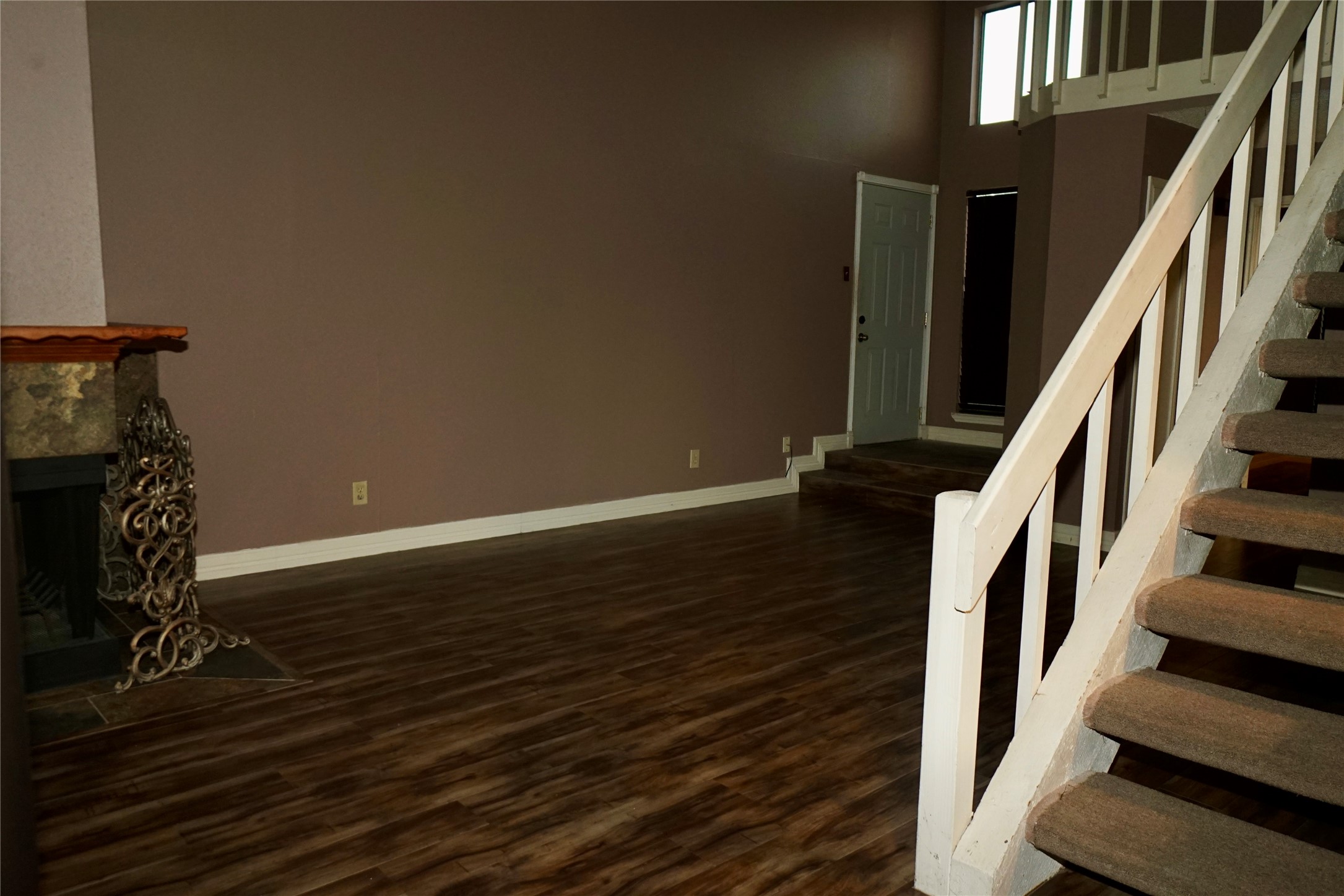 8275 Sands Point Drive, Unit 176 Houston, TX 77036 - Photo 20 of 31 a view of entryway with wooden floor and stairs