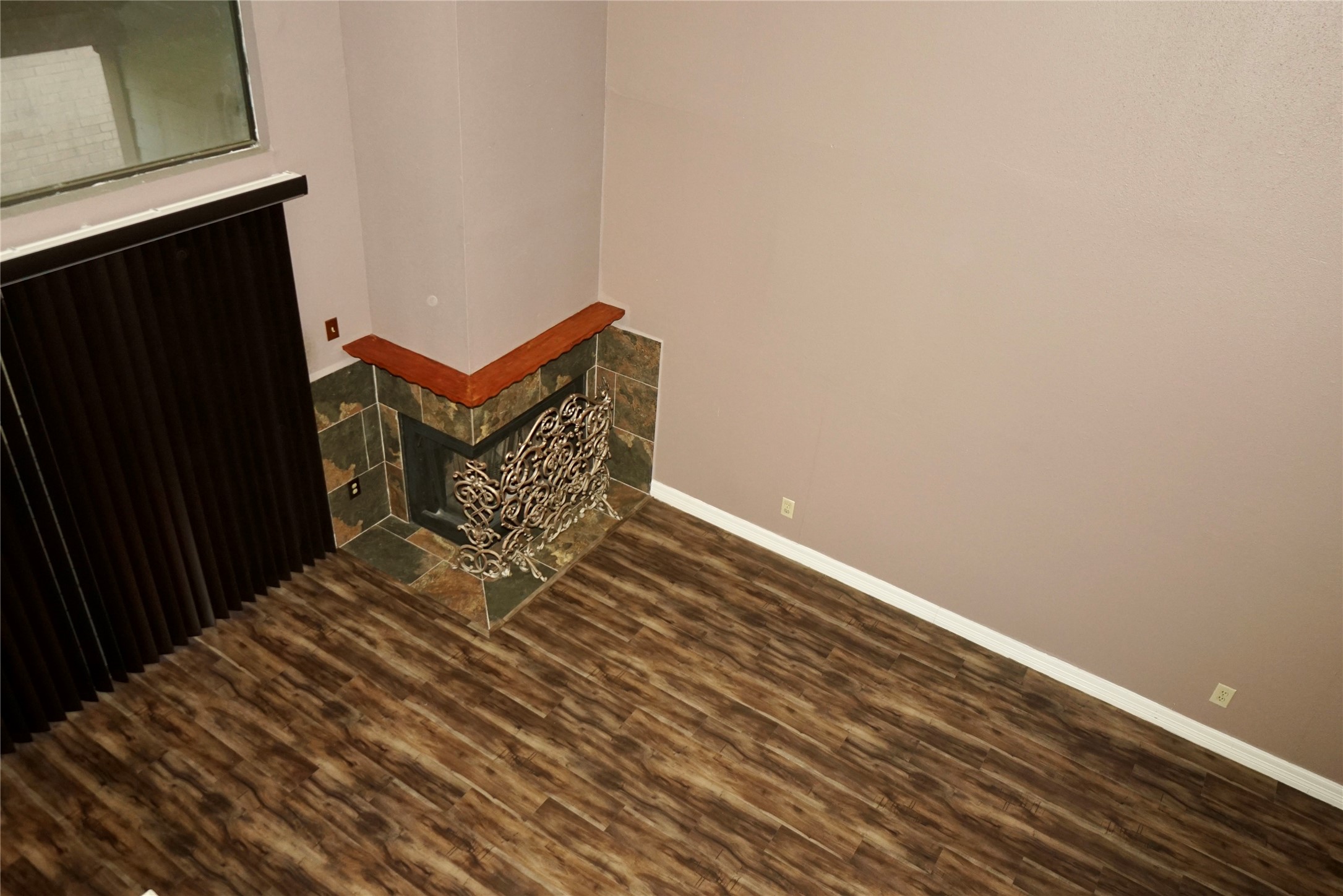 8275 Sands Point Drive, Unit 176 Houston, TX 77036 - Photo 22 of 31 a view of a room with wooden floor