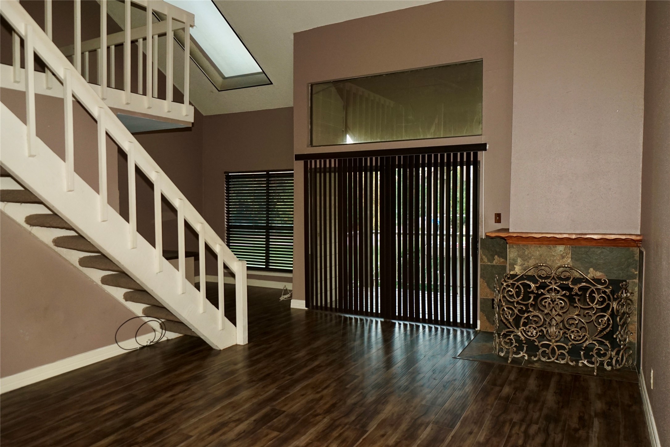8275 Sands Point Drive, Unit 176 Houston, TX 77036 - Photo 24 of 31 a view of entryway with wooden floor