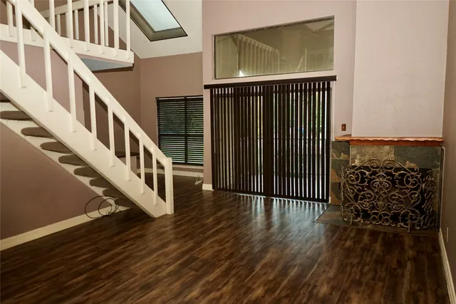 a view of a balcony with a floor to ceiling window