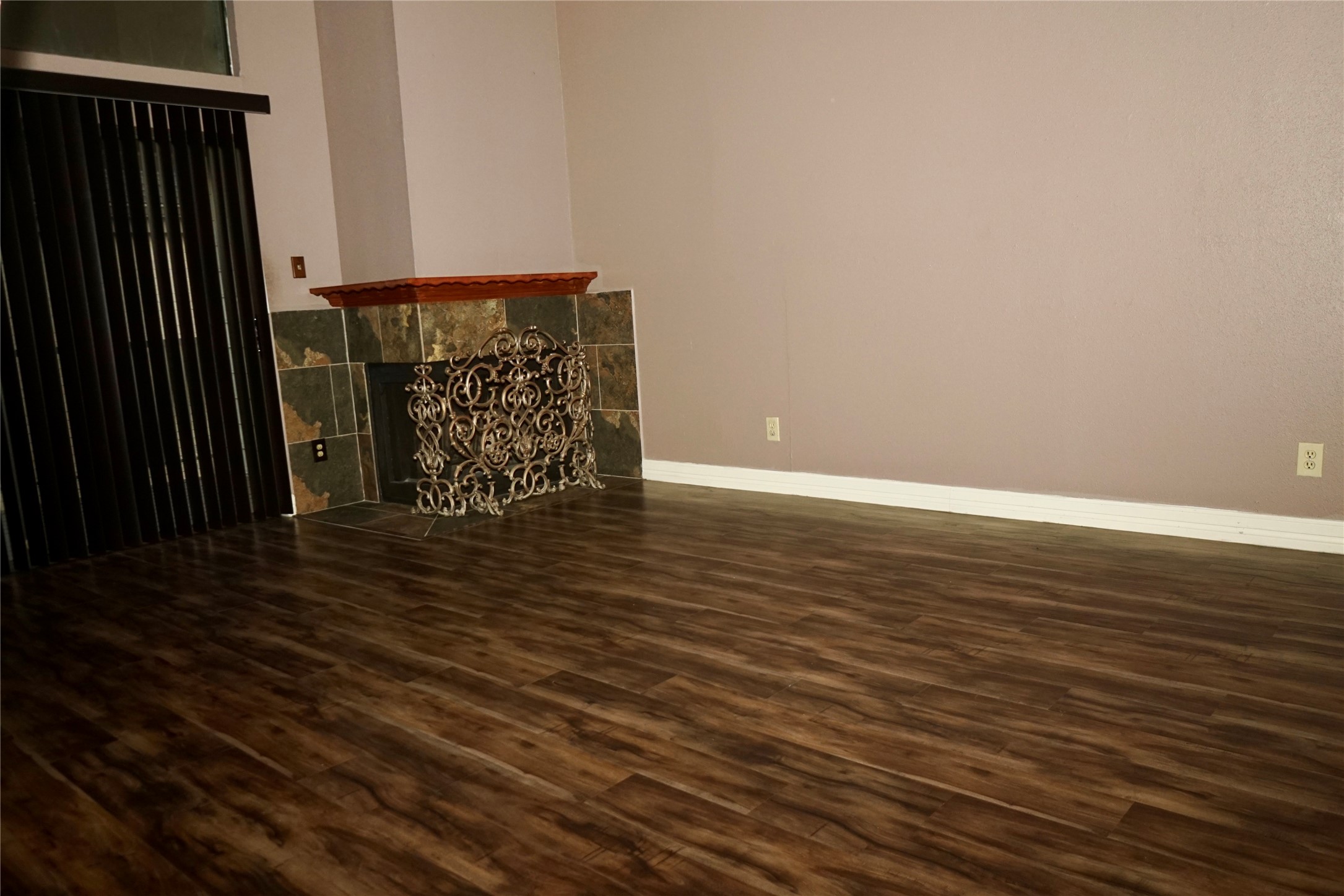 8275 Sands Point Drive, Unit 176 Houston, TX 77036 - Photo 4 of 31 a view of a room with wooden floor