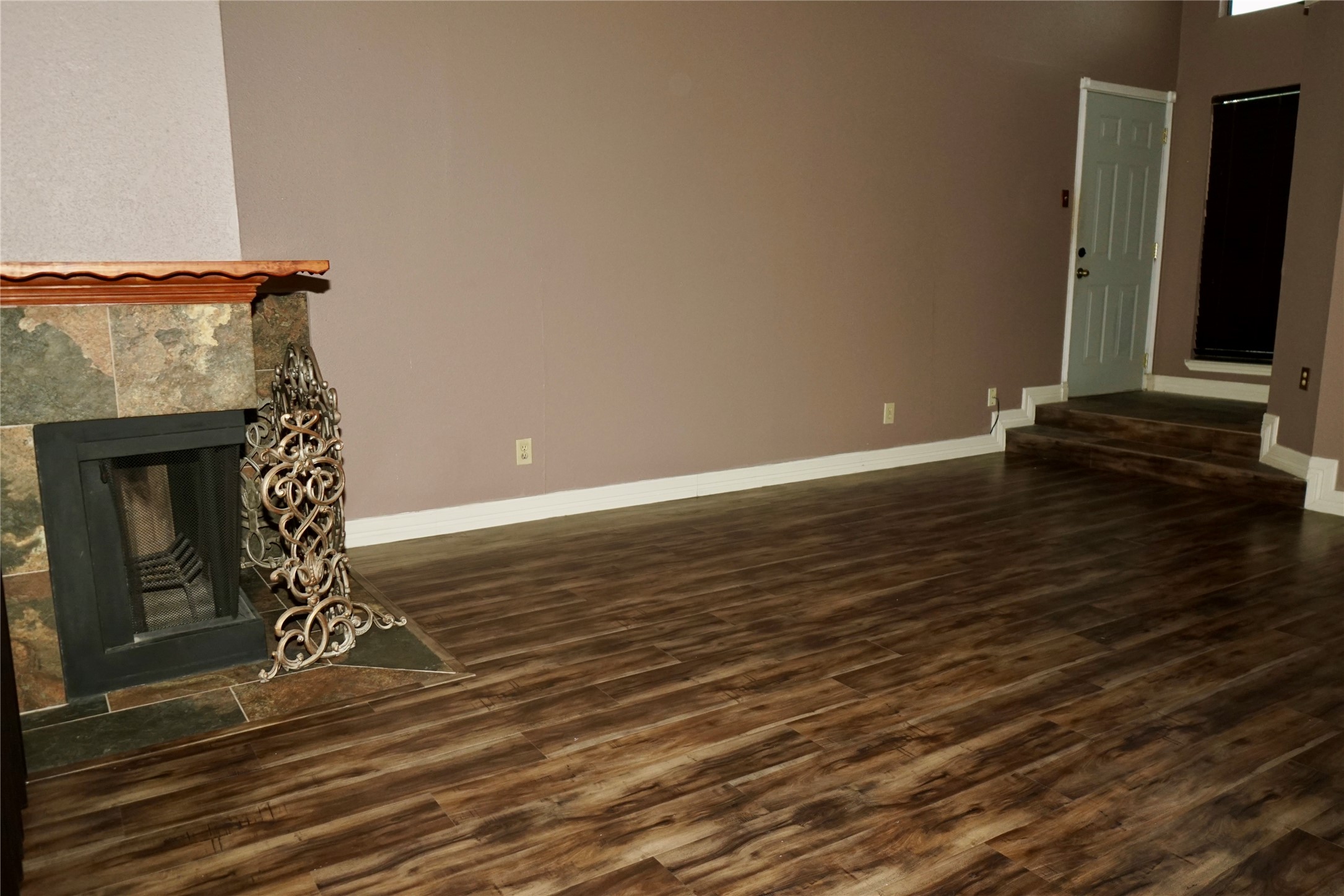 8275 Sands Point Drive, Unit 176 Houston, TX 77036 - Photo 10 of 31 a view of a room with wooden floor