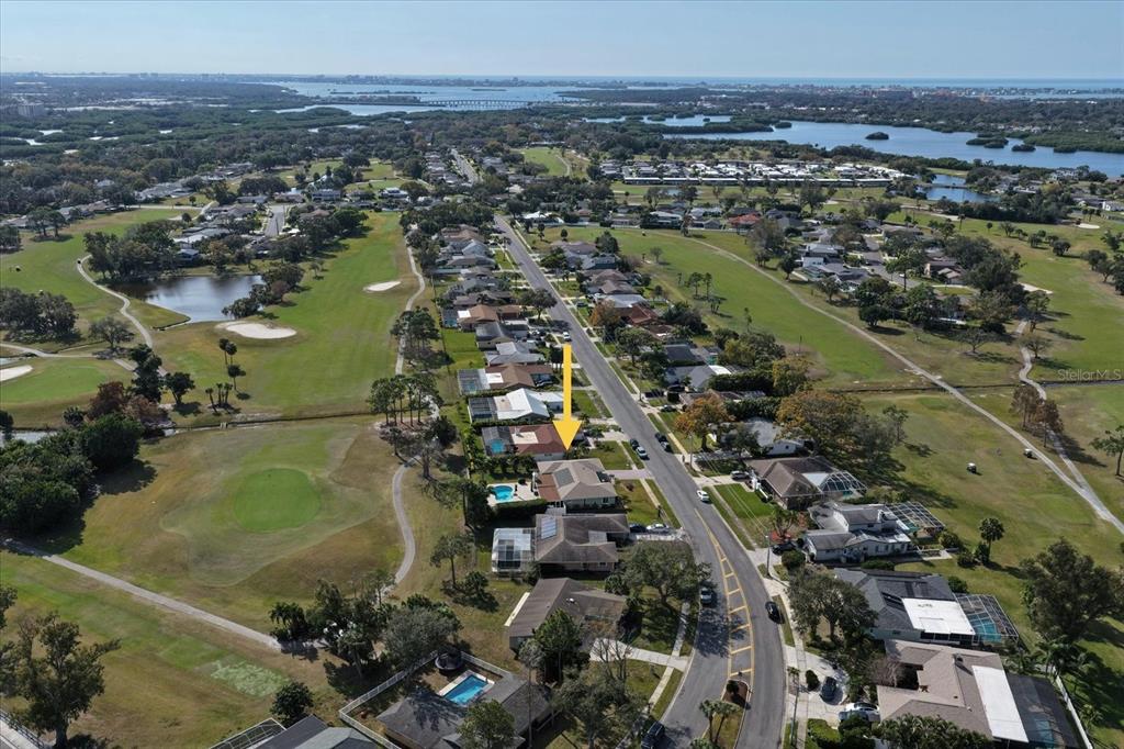 7133 Augusta Boulevard Seminole, FL 33777 - Photo 41 of 54 an aerial view of residential houses with outdoor space