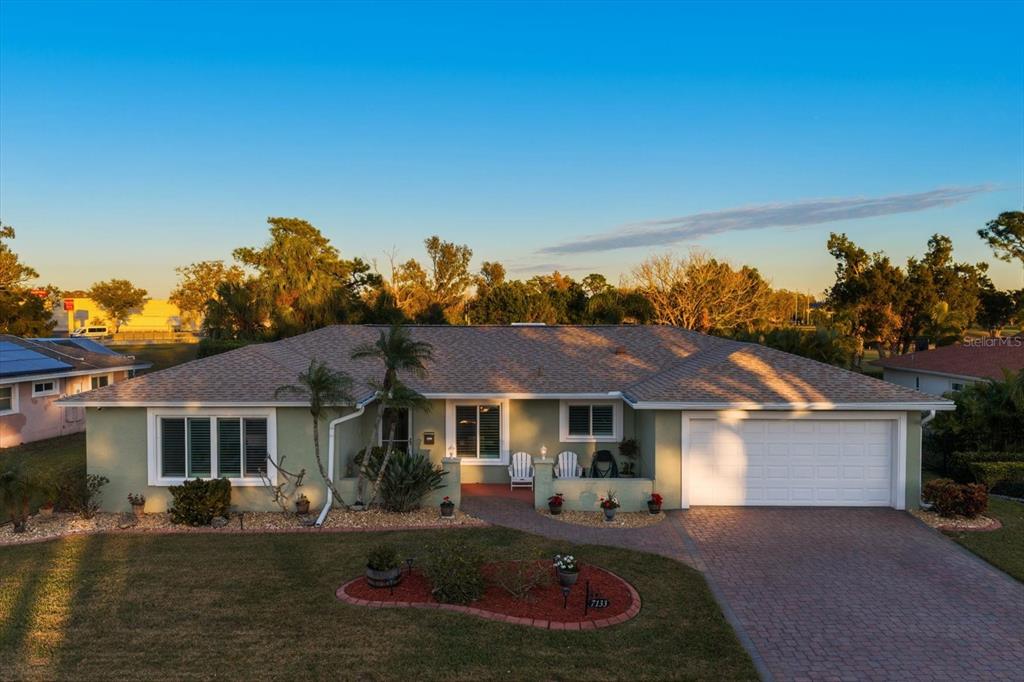7133 Augusta Boulevard Seminole, FL 33777 - Photo 43 of 54 a front view of a house with sitting area