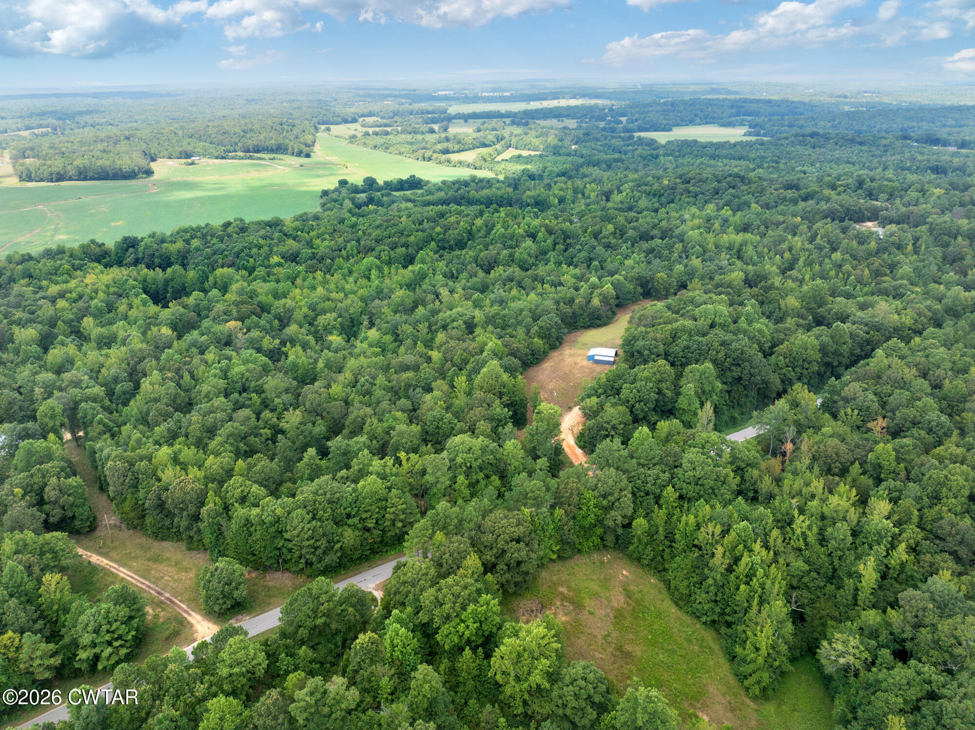 957 Holladay Road Parsons, TN 38363 - Photo 19 of 25 DJI_20250809132121_0934_D