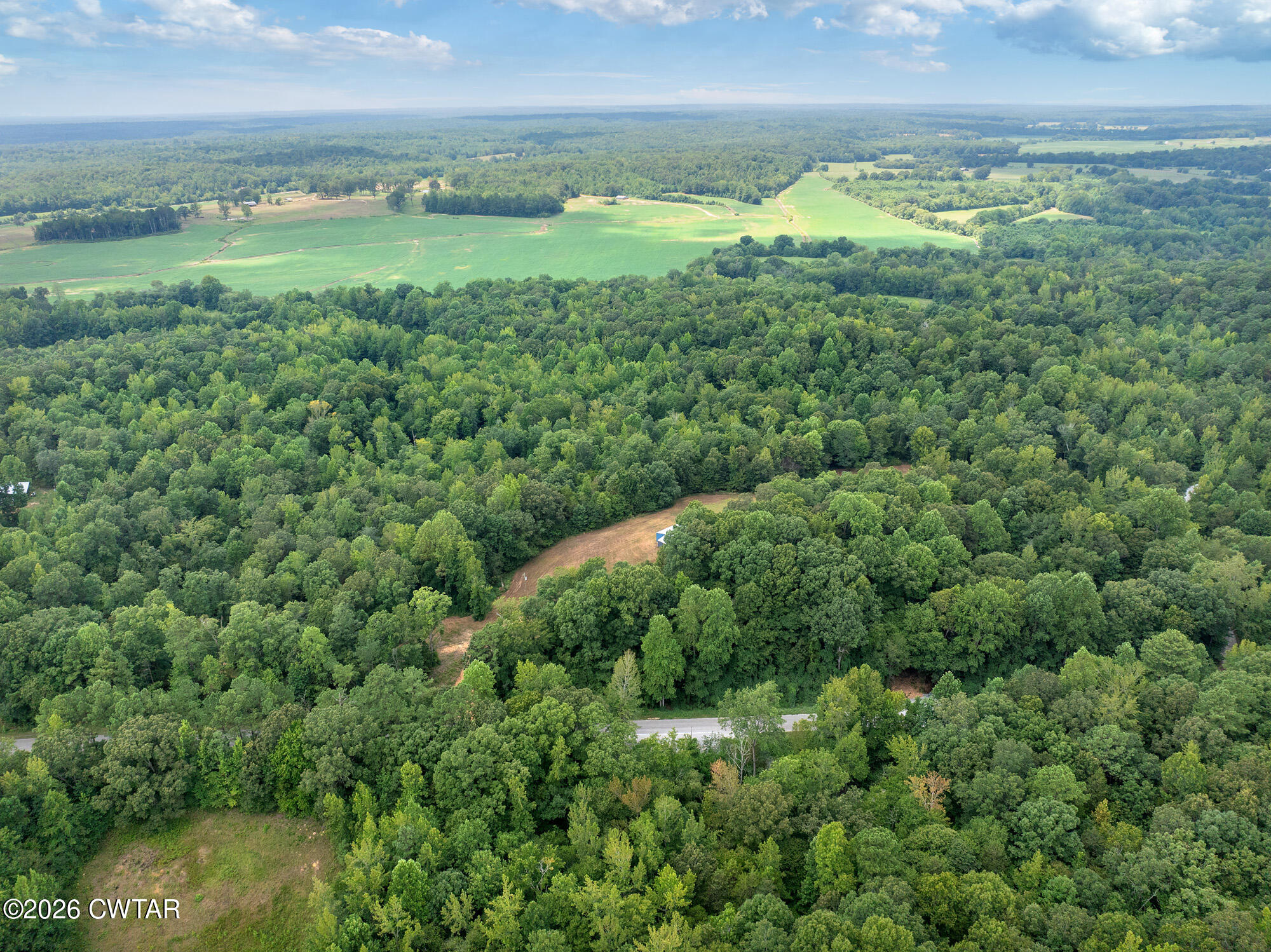 957 Holladay Road Parsons, TN 38363 - Photo 20 of 25 DJI_20250809132144_0935_D