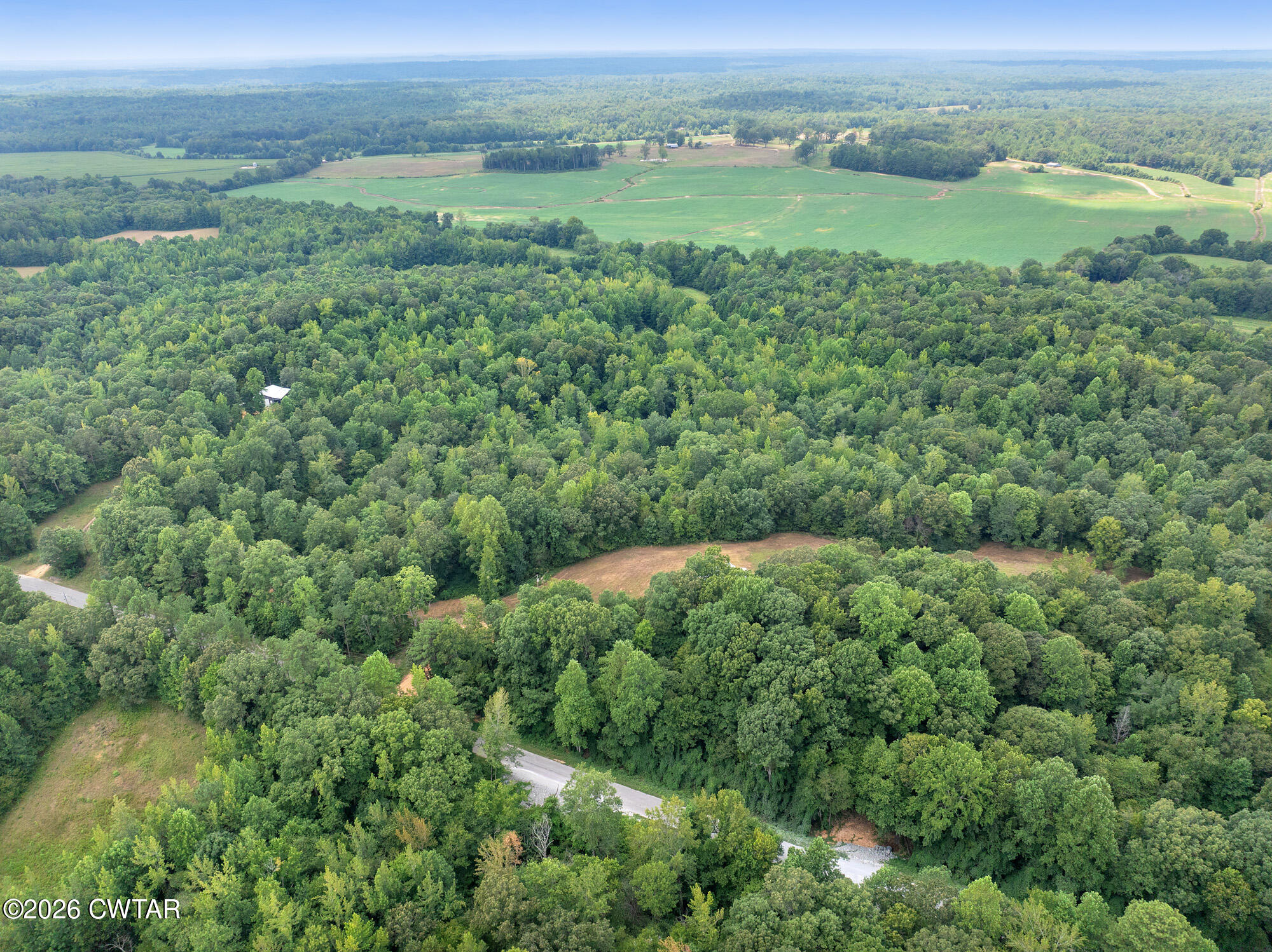 957 Holladay Road Parsons, TN 38363 - Photo 21 of 25 DJI_20250809132232_0936_D