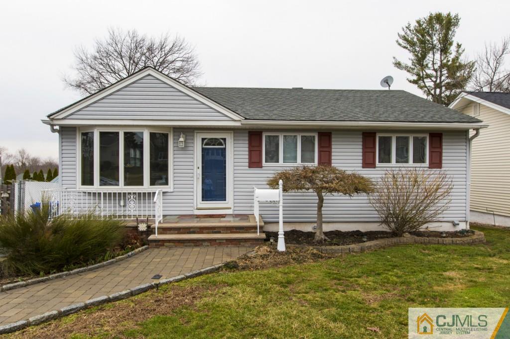 106 Normandy Road Colonia, NJ 07067 - Photo 1 of 25 a front view of a house with a yard