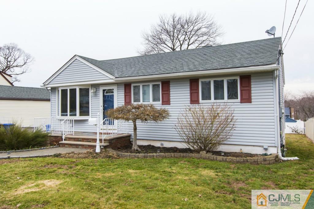 106 Normandy Road Colonia, NJ 07067 - Photo 2 of 25 a front view of a house with a yard