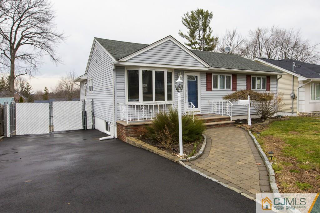 106 Normandy Road Colonia, NJ 07067 - Photo 3 of 25 a view of a house with pool