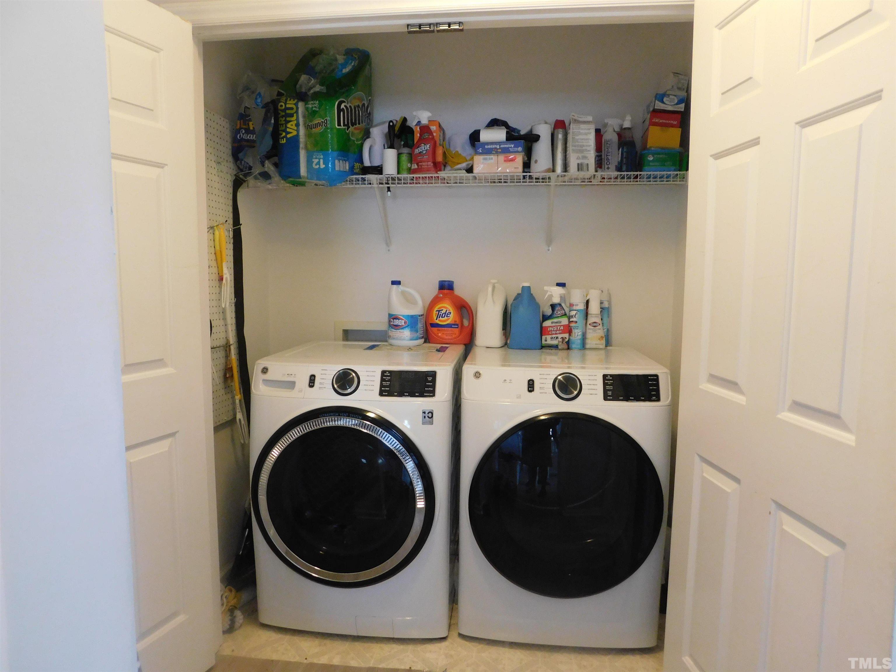 4017 Mardela Spring Drive Raleigh, NC 27616 - Photo 13 of 23 a utility room with dryer and washer