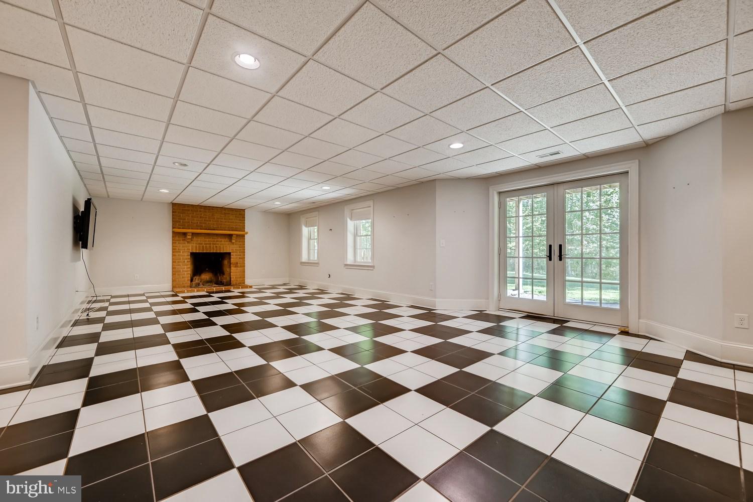 15801 Duncan Hill Road Sparks, MD 21152 - Photo 37 of 52 Rumford Fireplace, windows, French doors to outsid