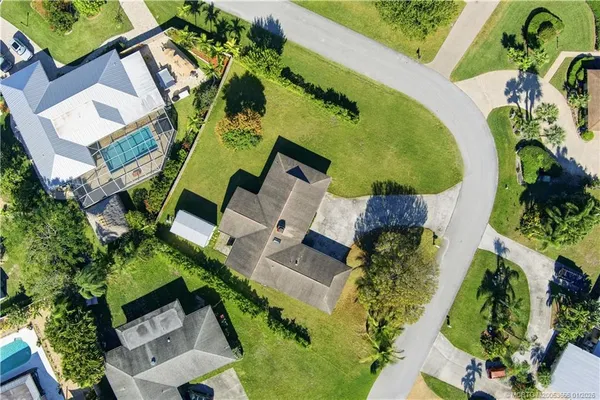 an aerial view of a house with a garden